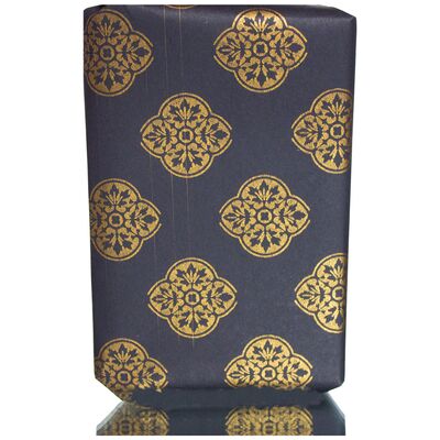 Gift wrapping paper with golden ornaments